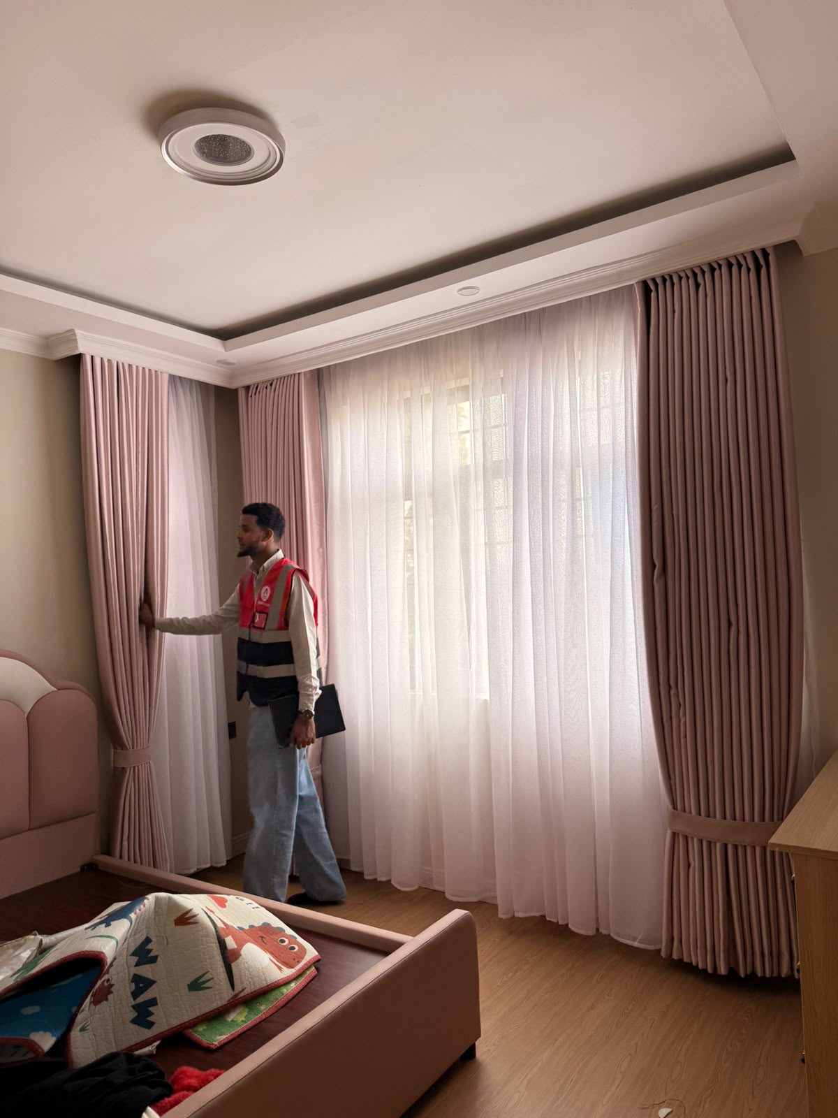 Custom pink wave-fold bedroom curtains installed by Abdii Finest Curtains Nairobi